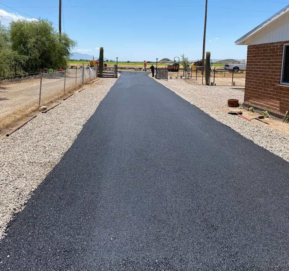 Summit Surface Solutions crew during sealcoating work